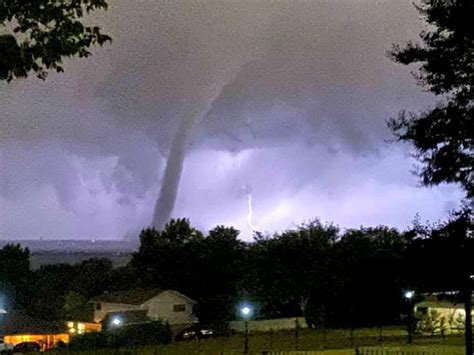 Tornadoes appear as rotating, funnel-shaped clouds extending to the ground from thunderstorms. Winds associated with tornadoes can range from about 40 mph to over 250 mph. Damage paths can exceed a mile wide and 50 miles long. Tornadoes can occur anywhere at any time - often near the trailing edge of a thunderstorm, often with clear skies .... 