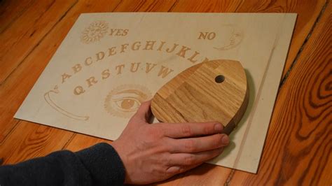 Electronic ouija board. DIY "smart" Ouija board with programmable sequence.Guts: - ESP32 - primary coil behind each letter - secondary/pickup coil around the window of the planchett... 