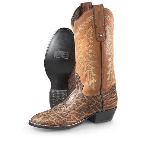 Elephant cowboy boots. This pair of Men’s Tony Lama Cowboy Boots are proudly made in the USA. They’re super tough and just as comfortable. These work boots feature a thick ... Tony Lama Mens Elephant Print Cowboy Boots XT5107. XT5107 BRN. $239.99. Regular Price $249.99. Free Shipping! View Size Chart. 