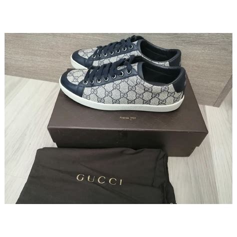 Elevate Your Style with the Iconic Navy Blue Gucci Sneakers