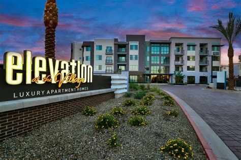 Elevation at the village. Elevation at the Village is a 214 Unit, four story urban, Class A apartment complex in Gilbert, Arizona. Apartment units average 828 square feet. Unit mix: 36 Studios (17%), 117 1- BR (55%), 61 2- BR (28%). The building sits on 7.61 acres gross / 6.53 acres net (284,447 SF). 