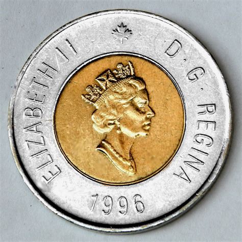 Elizabeth 2 d.g. regina coin value. Head of Queen Elizabeth II, as at 64 years of age, wearing the royal diadem, necklace, and earrings, facing right. Script: Latin . Lettering: ELIZABETH II D·G·REGINA 1996. Unabridged legend: ELIZABETH II DEI GRATIA REGINA . Translation: Elizabeth II Queen by the grace of God . Engraver: Dora de Pédery-Hunt 