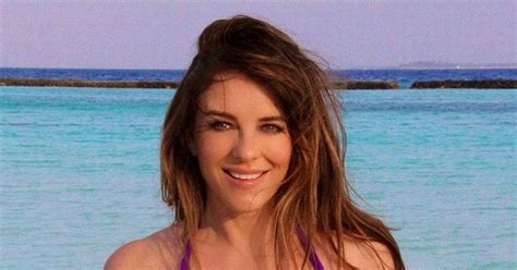 Elizabeth Hurley set pulses racing once again with another one of her sensational bikini photos, ... she wore a barely there nude-colored two-piece bikini with chain-link detailing on the top and ...