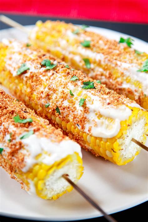 Elote. Add the corn. Cook until the corn has taken on some brown color, anywhere from 5 to 8 minutes. Add in mayo, sour cream, half and half, and ground meal. Stir to combine. Add more half and half or water it it's too thick for your liking. Top with cilantro and Cotija cheese. Season with salt and pepper flakes to taste. 