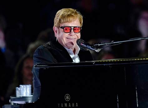 Elton John addresses Britain’s Parliament, urging lawmakers to do more to fight HIV/AIDS