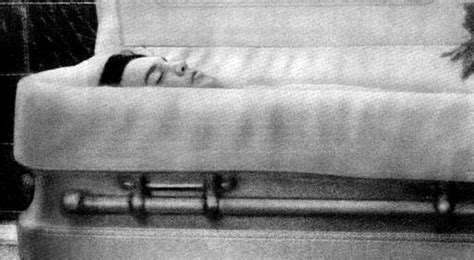 Elvis in his coffin. Elvis explains the viewing... 