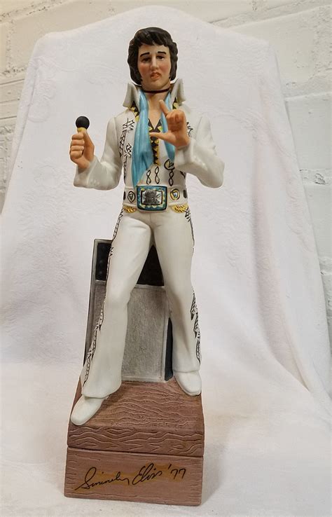 1977 Elvis Presley Jim Beam decanter. 15" tall. Plays "Love Me Tender". And wouldn't you know it...He's EMPTY. Thank you very muc... Collectors Weekly. Show & Tell. Sign in. All ... Vintage Wood Castle Chest Liquor De... $64. 12 3/4 Vintage Olive Green Cat Glas... $65. Set of 2 Vtg MCM Blue Belgium Glass... $39. Antique French Cordial Cave a .... 