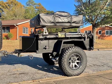 Embark on Adventure with Our Premium Kayak Trailer with Roof Top Tent