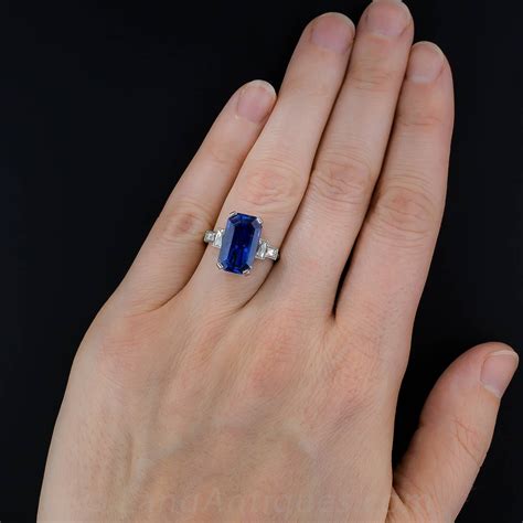 Emerald cut sapphire ring. A modern take on the traditional sapphire ring, this breathtaking emerald cut sapphire is set in an eye-catching chunky gold setting creating a ... 