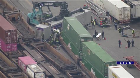 Emergency crews on scene of crash involving truck, freight train in Back of the Yards