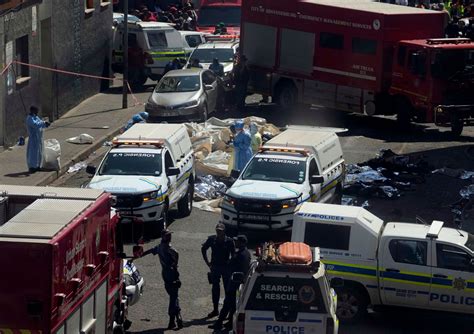 Emergency services leave South Africa fire scene. Now comes the grisly task of identifying bodies