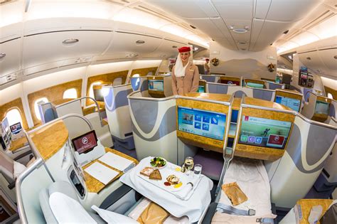 Emirates business class. Business class was very comfortable and the service was top notch. The plane has a real bar you can hang out at and stand for a while. The drink options are ... 