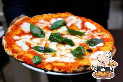 Emma pizza. at Vinys and Mark We offer authentic wood fire Italian Pizza, Pasta and Calzone. 