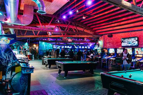 Emporium arcade bar chicago. October 26, 2016. Want to drink from an extensive craft beer list while also playing your favorite childhood video games like Donkey Kong, NBA Jam, Pac-Man, and NFL Blitz? You can do exactly that at Headquarters in Lakeview. There’s a River North location too. 
