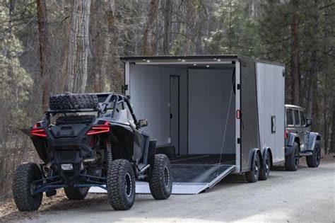 Enclosed utv trailer.  surrounded by walls, objects, or structures: 2. .  ...