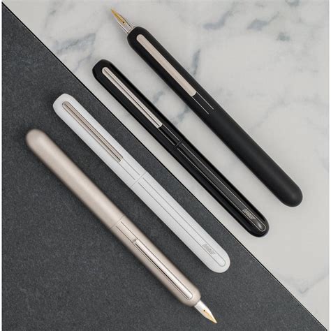 Endlesspens - Buy LAMY Studio Fountain Pen from EndlessPens. This fountain pen from LAMY is made with matte lacquer finish, has a snap cap, cartridge filling mechanism but you can buy a separate Z27 converter, has a stainless steel nib material, is available in 12 different variants, & includes a E188 gift box. 