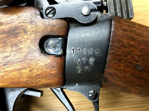 On the Butt Socket there will be small, almost impossible to see marks. These are M.O.D. broad arrow, dates, crosses (proof mark), plus signs (which indicate condition of the rifle), and the original manufacturer (usually a code like M47C ( this is BSA Shirely mark)). On the receiver ring are small marks.. 