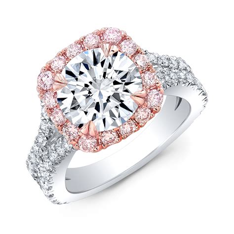 Engagement pink diamond ring. This ring is a perfect combination of romance and fashion making it perfect for engagement or every day wear. Piece Details: 18kt White and Rose Gold, (16) ... 