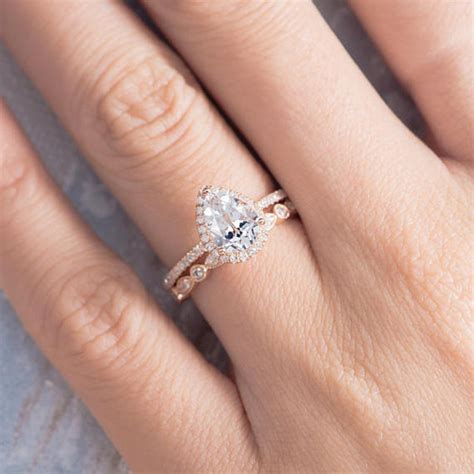 Engagement ring and wedding band. During the ceremony, your almost-husband or wife will slip your new wedding band on your now-naked left hand ring finger. This makes for the best ring exchange ... 