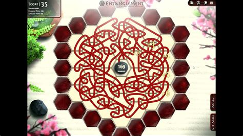 Entanglement game. Create the longest path possible and challenge your friends in the game of Entanglement. Entanglement is a puzzle game made for you by Gopherwood Studios. Try to make the longest path possible. Rotate and place hexagonal tiles etched with paths to extend your path without running into a wall. 