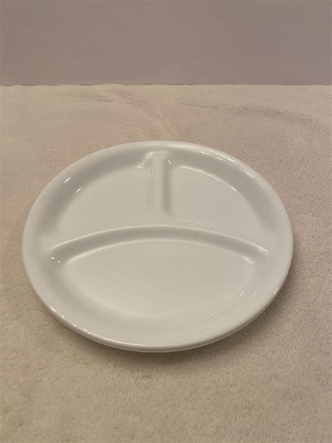 Entree corelle divided plates.  These durable, dishwasher-safe plates come in va...
