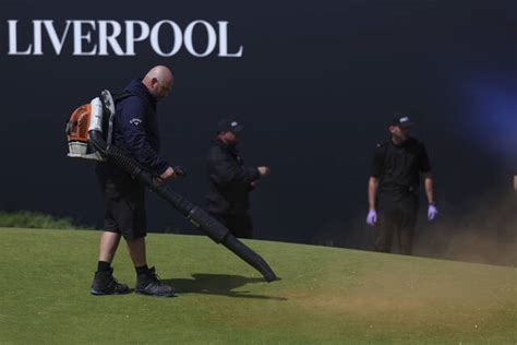 Environmental activists disrupt play at British Open by throwing orange substance on 17th green