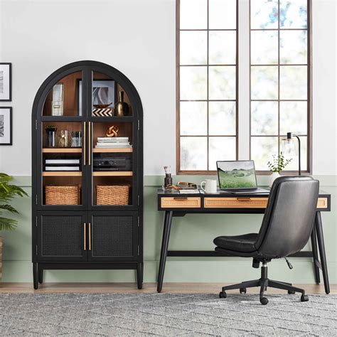 Enzo bookcase. The Member’s Mark™ Enzo Bookcase Storage Cabinet is a stylish option for displaying your favorite books and keepsakes. The rich black finish paired with the pop of golden brown shelves brings mid-century modern charm to any room in your home. 