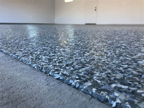 Epoxy flake. Durability: Epoxy flake flooring is incredibly durable and can withstand heavy use. It's resistant to stains, chemicals, and scratches, making it ideal for high ... 