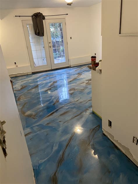 Epoxy for floors. One drawback that some people notice is an unpleasant odor, but this usually dissipates over time. 5. Vinyl planks or tiles. ($2-$7/sq. ft.): This basement flooring option offers great value for the money. Vinyl tile and vinyl plank flooring are easy to install, thanks to interlocking joints. 