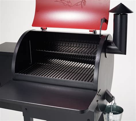 Er1 on traeger grill. Place your pizza stone on the grill grates. Set your grill as high as it will go. Let the stone preheat for an additional15 minutes. Place the pizza on the stone. Cook until the crust is nicely browned. Remove from the pizza stone and let rest. Slice and serve. 