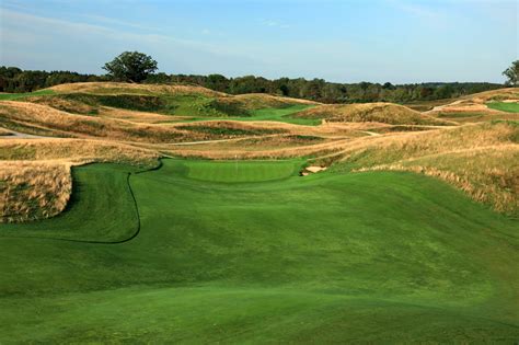 Erin hills. Erin Hills is so severe by design, had this course played firm and fast, it would have put extreme stress on the USGA for their setup. "I think you see that in a lot of modern courses today. 