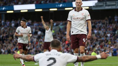 Erling Haaland scores 2 as Man City opens Premier League title defense with 3-0 win at Burnley