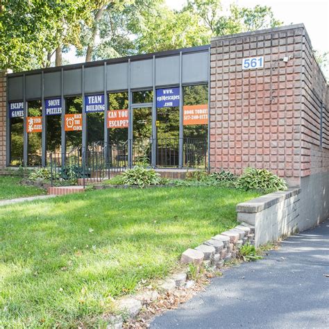 EpIQ Escapes is located at 561 Wildwood Ave, Jackson, MI. The brown brick building has a glass front that bears various escape slogans on blue and orange posters. The door leads you inside the lobby that accommodates you in the building. The spacious lobby is painted with grey walls and features cozy colorful couches that offer you seats in the .... 