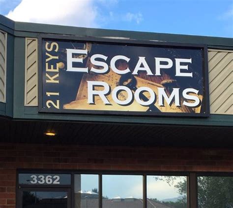 Escape rooms colorado springs. The 21 keys escape room is located at 3362 Templeton Gap Road, Colorado Springs. The building has a red-brick exterior with glossy black French windows and glass doors. The black and yellow signboard at the entrance makes the venue easy to recognize. 