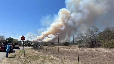 Evacuations lifted in Kyle as crews battle wildfire
