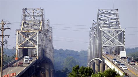 Evansville twin bridges. The I-64 Sherman Minton Bridge (built in 1960-61), I-40 bridge at Memphis (1973) and U.S. 41 southbound Twin Bridge (1965) were all constructed before those standards went into effect. 