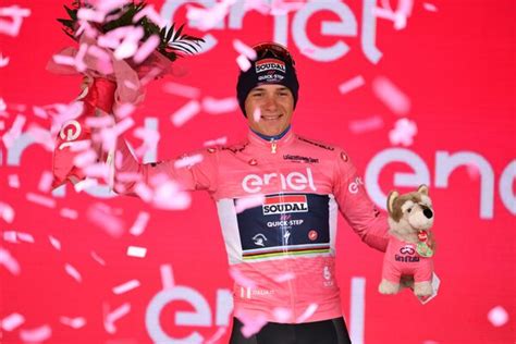 Evenepoel wins time trial by a second to move back into overall lead of the Giro