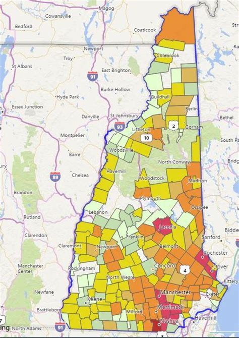 Outage maps from around 7:30 p.m. on Dec. 23, 2022. (Unitil, Eversource, New Hampshire Electric Co-Op) A tree nearly fell on a house on Pleasant Street in Concord on Dec. 23.. 