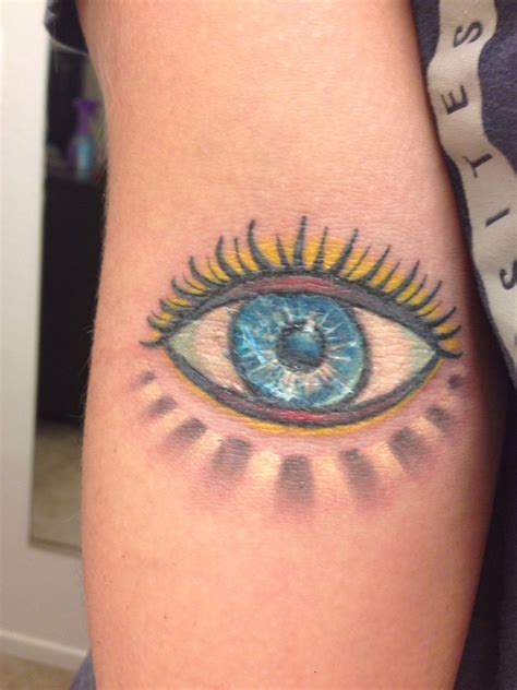 Evil eyeball tattoo. An evil eye tattoo is a popular design that has its roots in ancient cultures and beliefs. The symbol of an evil eye is often associated with protection against negative energies, jealousy, and harm caused by the envy of others. It is believed that wearing or displaying the symbol of an evil eye can ward off evil spirits and protect oneself ... 