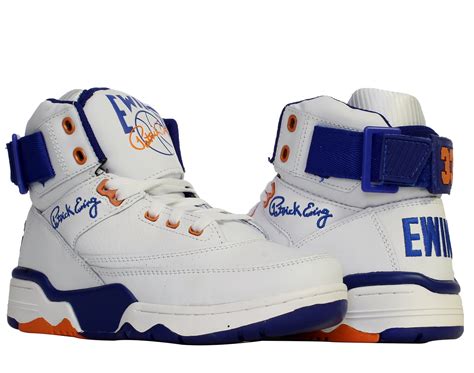Ewing shoes. 33 HI Black/Royal. The flagship Ewing Athletics shoe, the 33 HI is an exact retro of the 1990 original, and features a classic reversible ankle strap that can be worn on the front or back of the shoe, and a full length PU midsole for cushioning. This colorway features a premium Black and Royal nubuck upper with ORLANDO inspirations. 