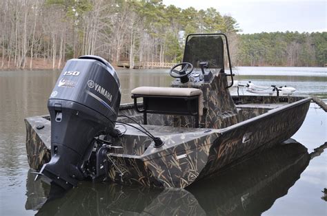 Alumacraft makes their Jon Boats in various lengths, from 10 to 16 feet. Prices range from $980 to $11,000. Higher-end ones, like the 1648 Jon, come with a primary center storage area. The flat bottom of these boats makes them highly stable and can easily accommodate you and your favorite retriever.. 