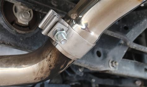 Exhaust leak fix. Step 1: Locate the flange where the leak is occurring. Step 2: Remove any debris or rust from the flange and surrounding area. Step 3: Inspect the gasket. If it is damaged or worn, replace it with a new one. Step 4: Apply a thin layer of exhaust system sealant on both sides of the gasket. 