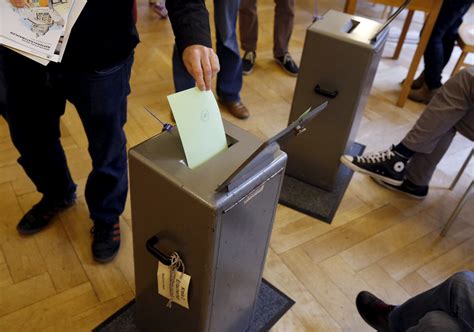 Exit polls show Swiss anti-immigrant party on track for record election showing