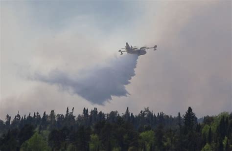 Experts urge caution as forest fire season ramps up in Ontario, flames spread in the west