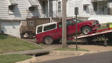 Expired tag or derelict? Police called as city tows truck from private driveway