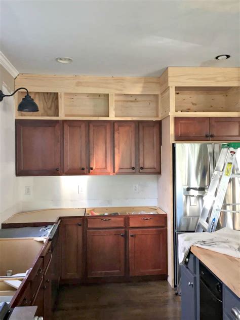 Extending kitchen cabinets to ceiling. 21 Sept 2021 ... During a kitchen remodel, your cabinetry is likely to already take up the bulk of your budget. You should note that extending your cabinet boxes ... 