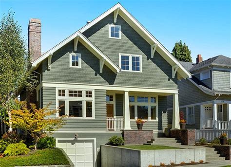 Coastal Blue Exterior Home Ideas. This cozy lake cottage skillfully incorporates a number of features that would normally be restricted to a larger home design. A glance of the exterior reveals a simple story and a half gable running the length of the home, enveloping the majority of the interior spaces. To the rear, a pair of gables with ....