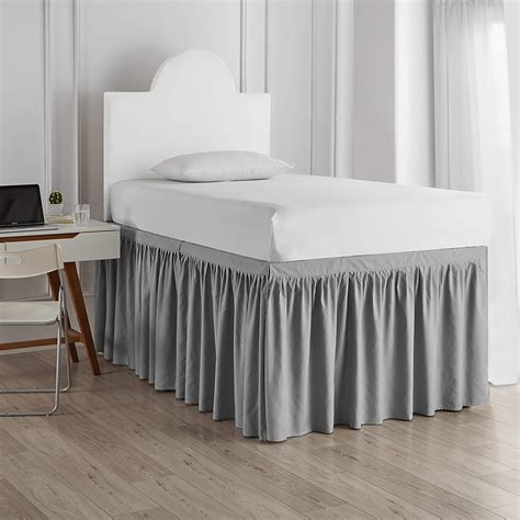 For an extra-long twin-sized bed, the fitted sheet measures 39 inches in width and 80 inches in length and the flat sheet measures 66 inches in width and 102 inches in length. A comforter sold for an extra-long twin-size bed is 90 inches in.... 