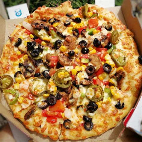 Extravaganza pizza. Extravaganza pizza from Domino’s is a must-try! Order it today for Iftar after a long fasting day! Call us at 19223 Or order online www.dominos.com.eg 
