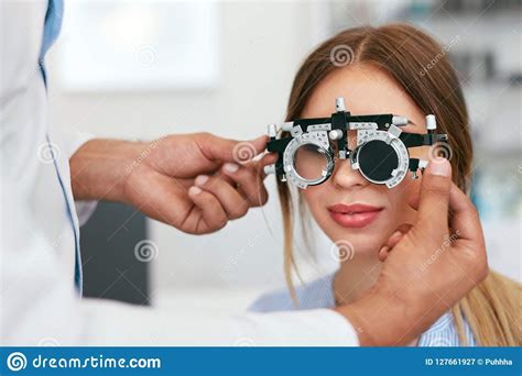 Eye exam and glasses. To use a standard eye exam chart, stand 20 feet away from the chart and read the smallest line of letters you can see. Each line corresponds to a certain level of visual acuity. Th... 